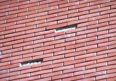 Reparación Enchape Muro Exterior